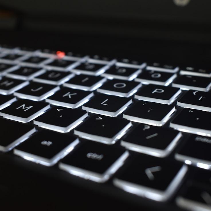 Mobile app project planning workspace with devices and development tools